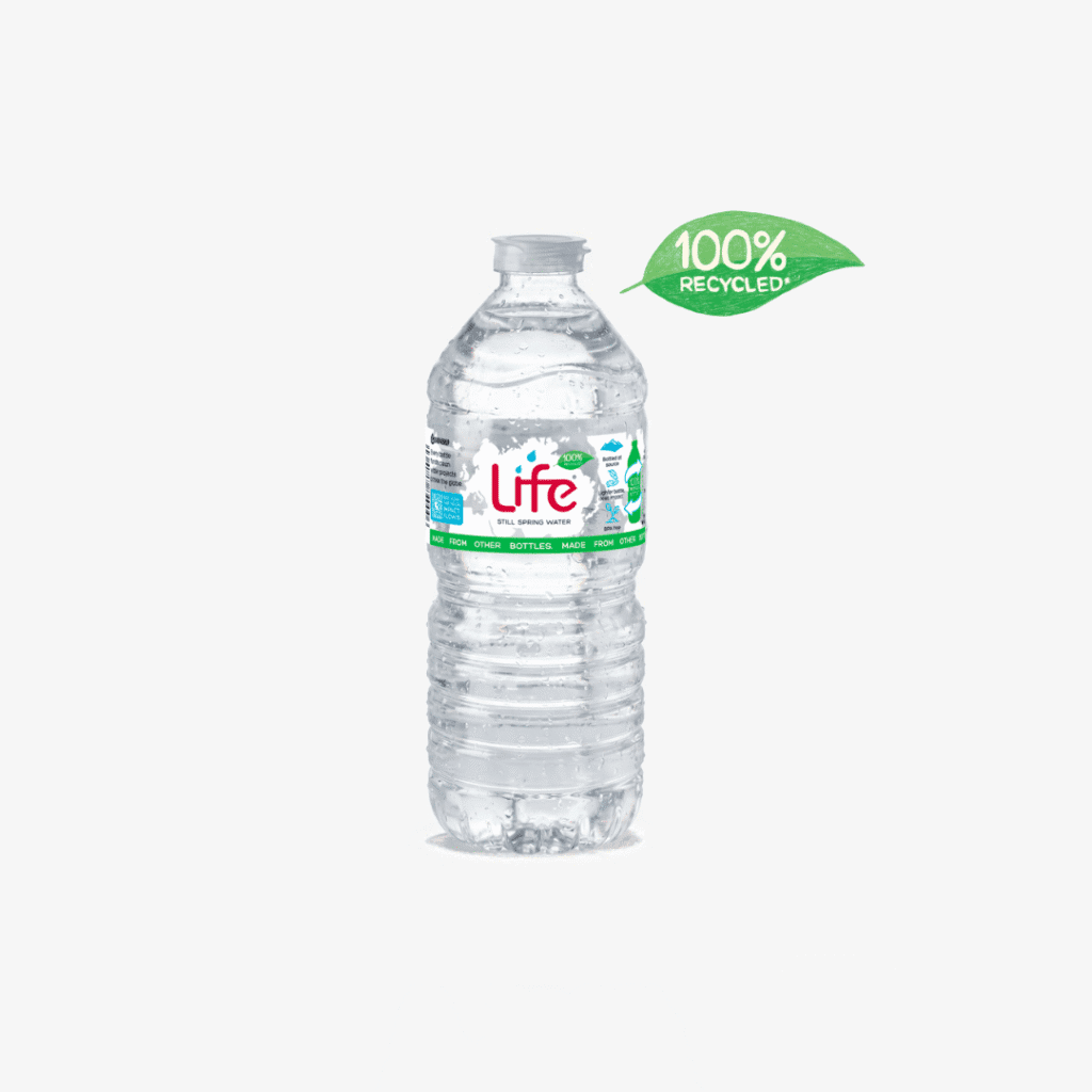 A clear plastic bottle of Life purified water with a green label stating 